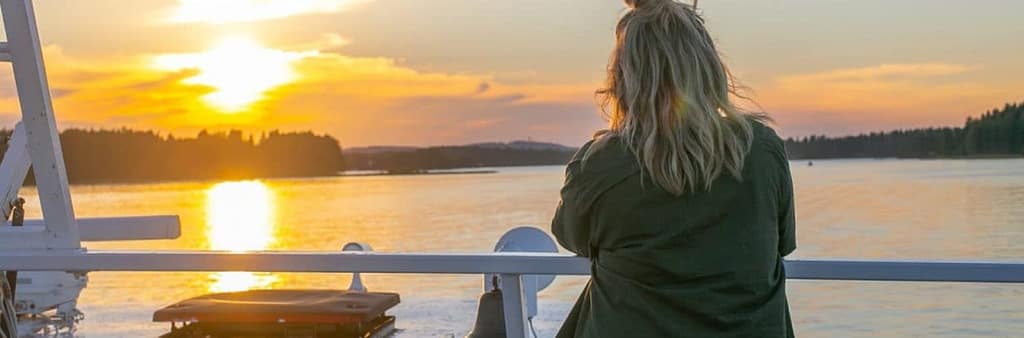 woman looking at the view on a cruise