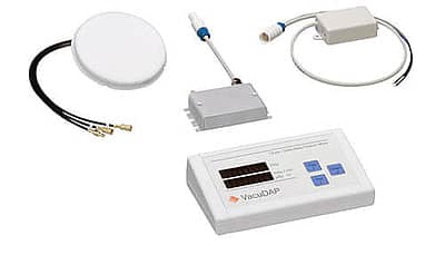 VacuDAP potilasannosmittari ja sen osia pöydällä